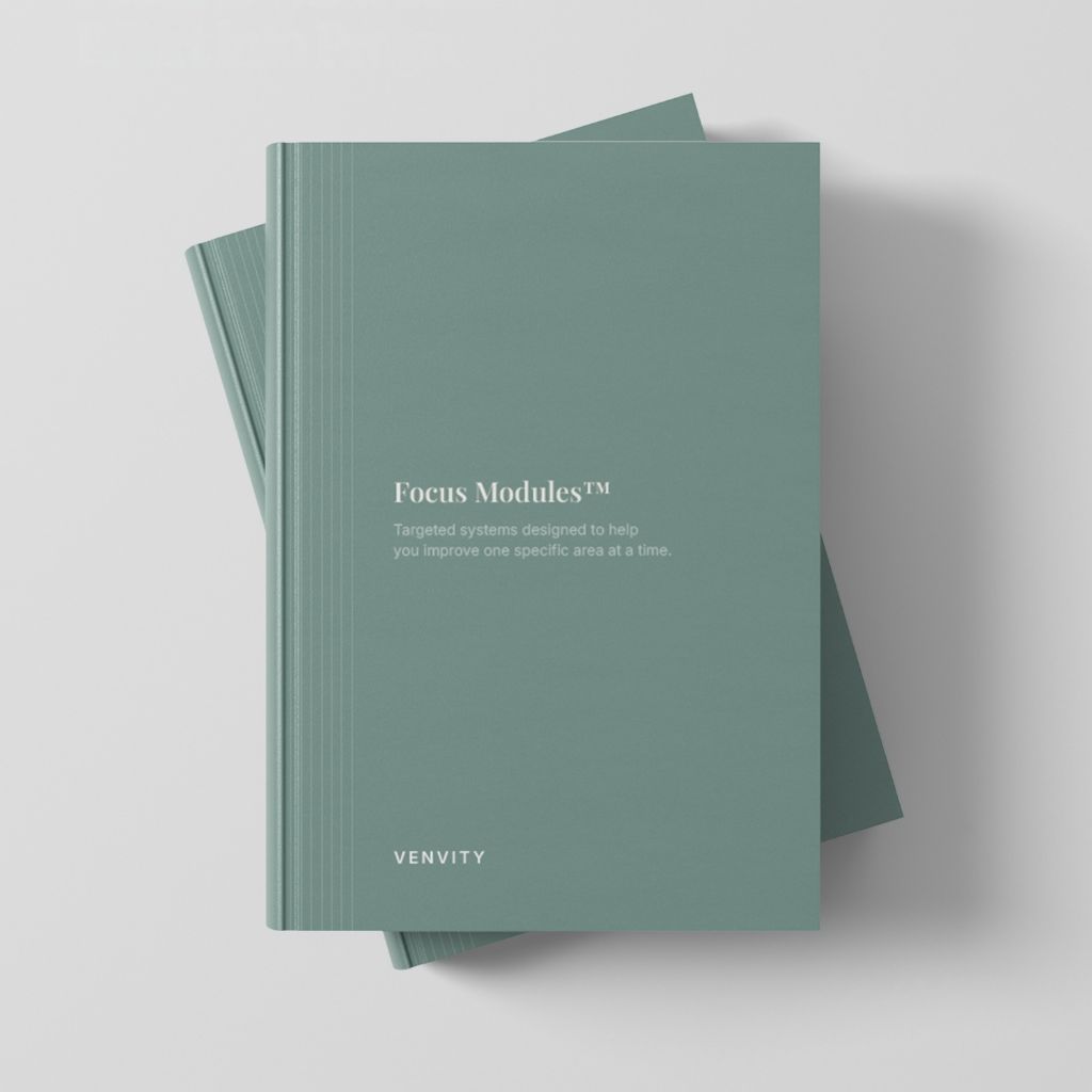 Focus Modules — two stacked green notebooks on grey background
